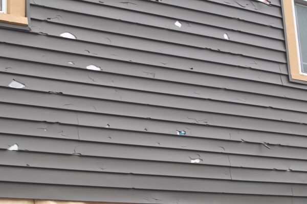 Damaged Siding Replacement in Vista